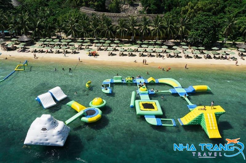 Bật Mí 10 Bãi Biển Nha Trang Đẹp Nhất, Thu Hút Du Khách Thập Phương 39 Bãi biển Hòn Tằm có làn nước trong xanh, bãi cát trải dài mịn màng cùng hàng dừa xanh mát.